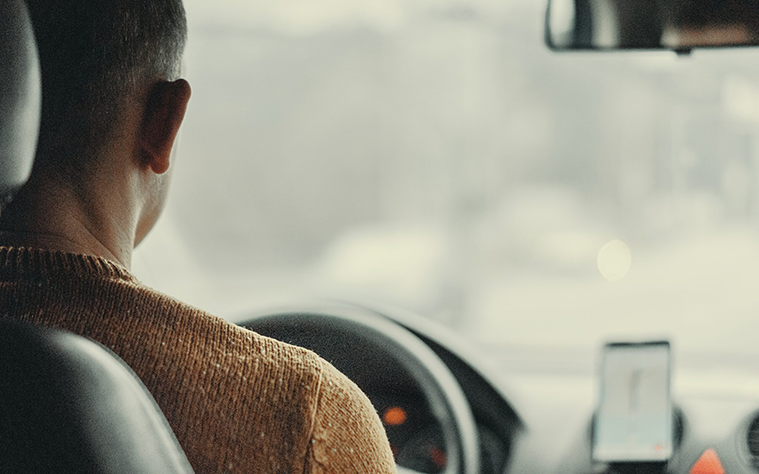 Man driving a car